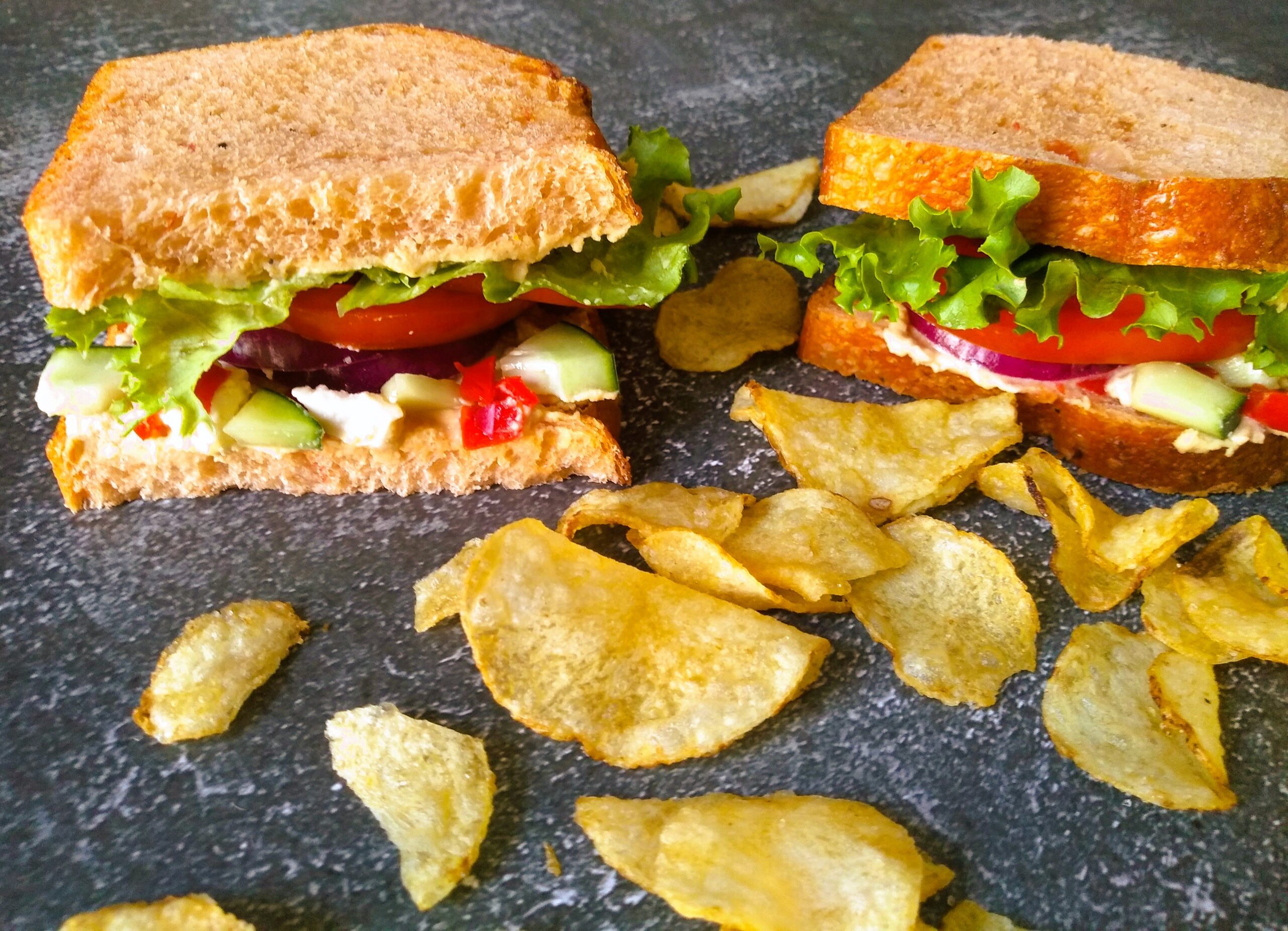 Panera Mediterranean Veggie Sandwich with apple and potato chips